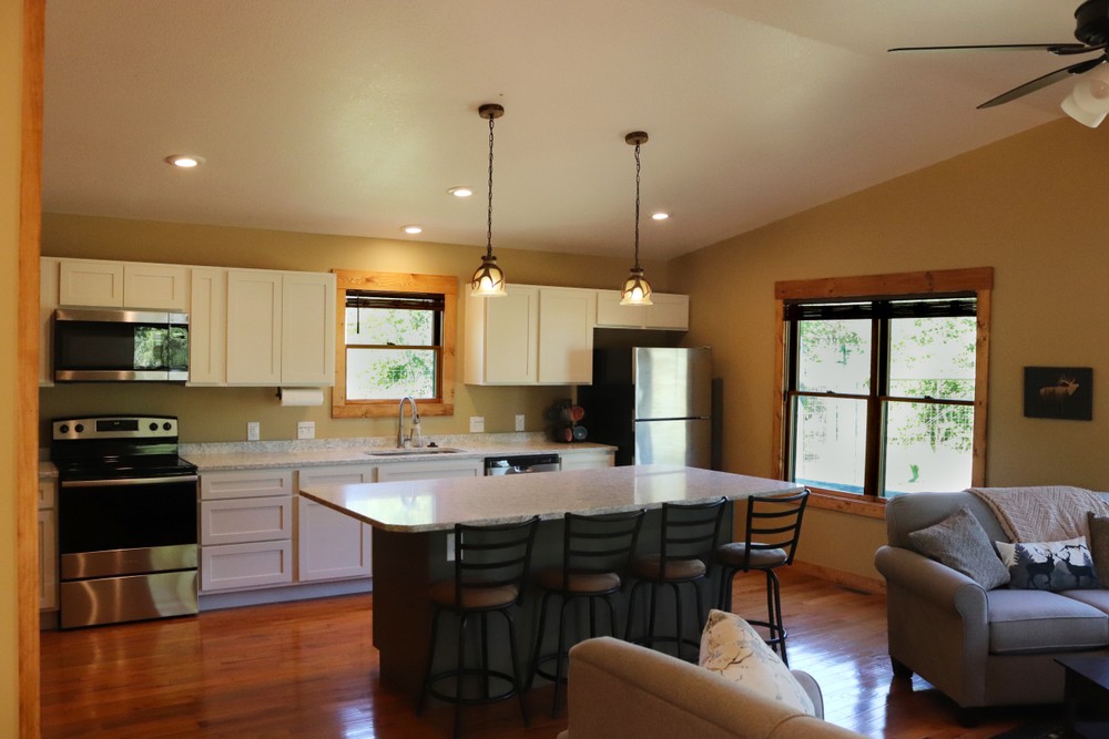kitchen interior with island and bar stools