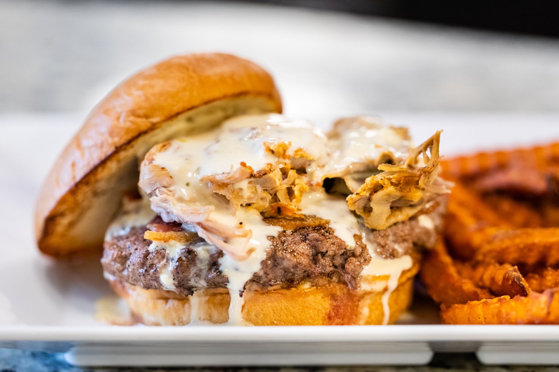 burger with fried onions and cheese