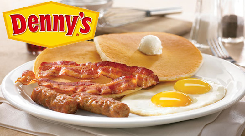 Breakfast from Denny's including pancakes, bacon, sausage, and eggs.