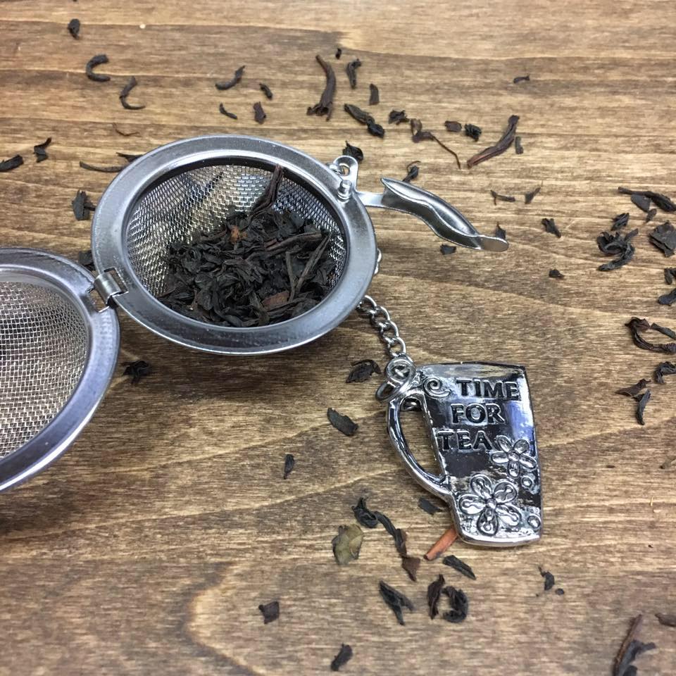 Tea leaves and strainer from Walnut Street Tea Company.