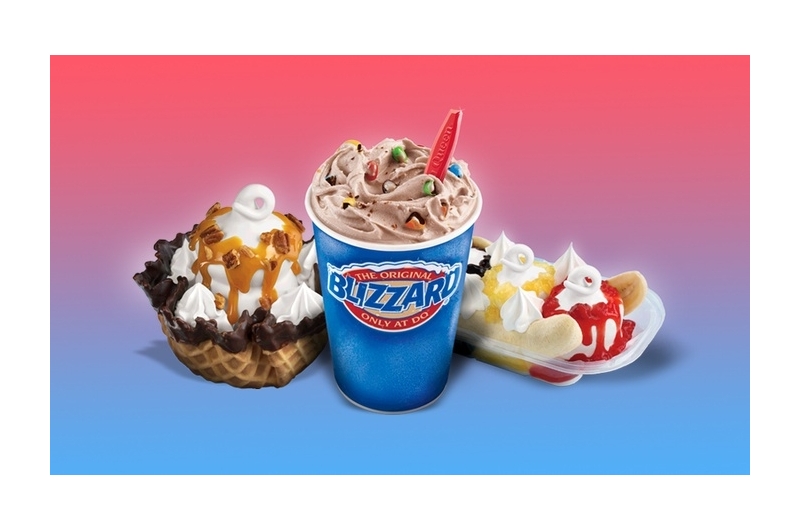 Ice cream from Dairy Queen including an ice cream sundae in a waffle cone cup, blizzard, and banana split.