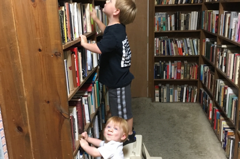 Children looking at books at Jane Addams Book Shop