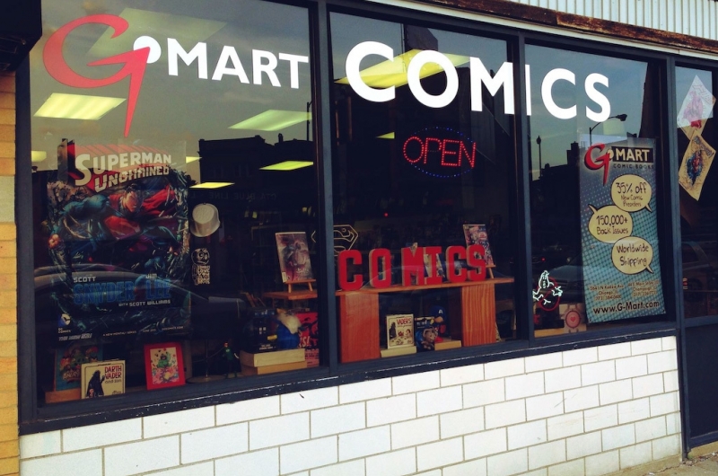 Window display featuring comics from Dark Tower Comic in Downtown Champaign.