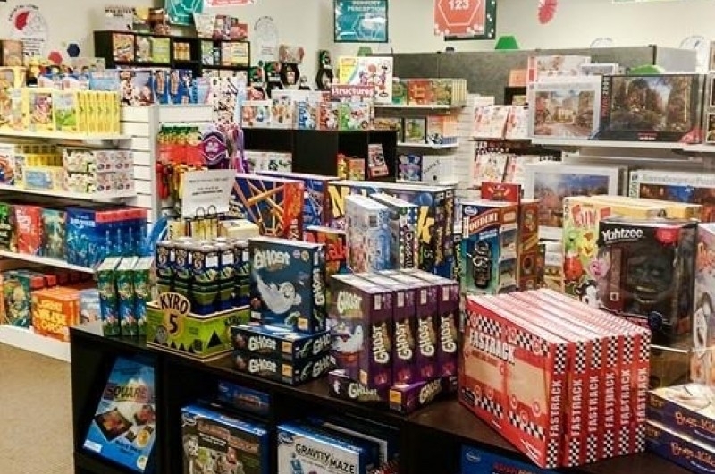 Display table at Dr. G's Brainworks featuring boardgames.
