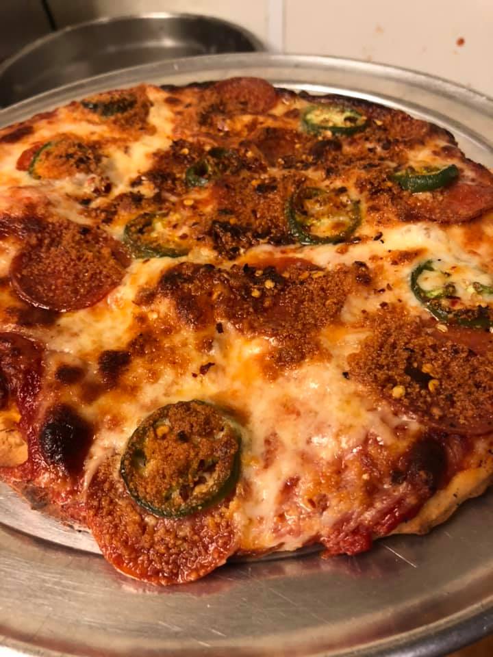 Pizza from Filippo's with pepperoni and green peppers.