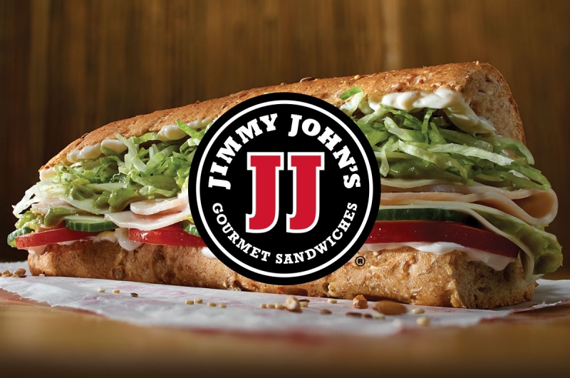 Jimmy Johns logo with a sandwich behind it.