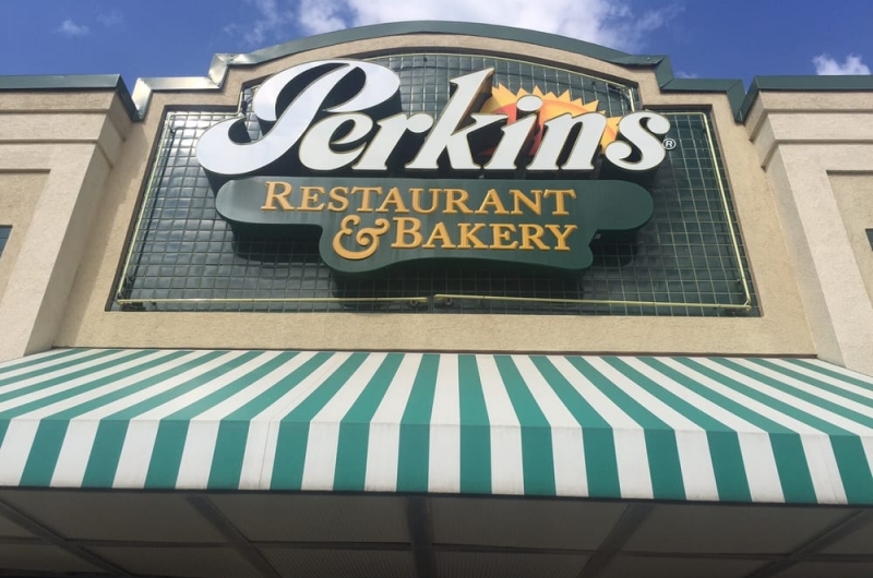Exterior sign for Perkin's Restaurant & Bakery.
