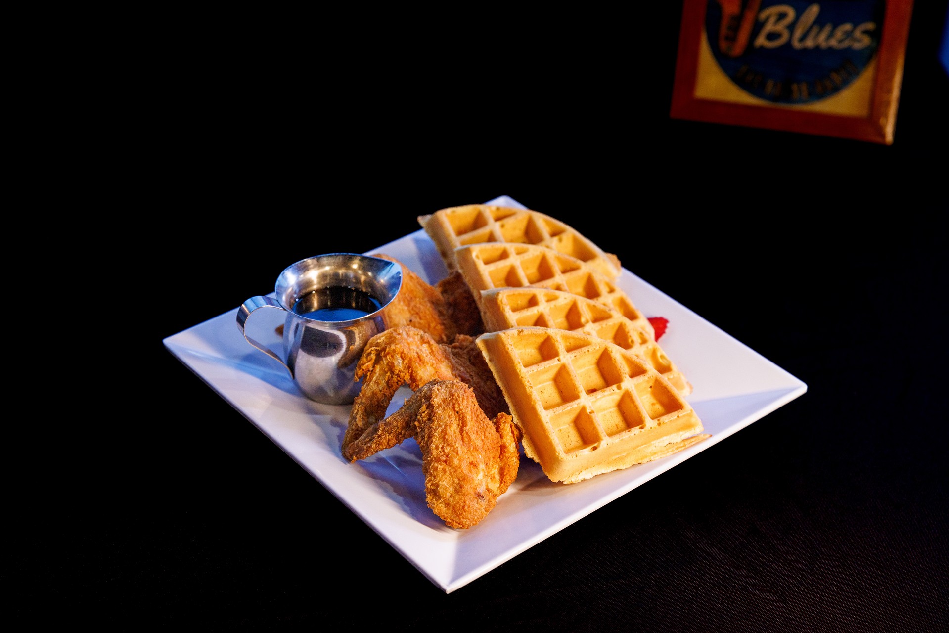 Plate with fried chicken and waffles