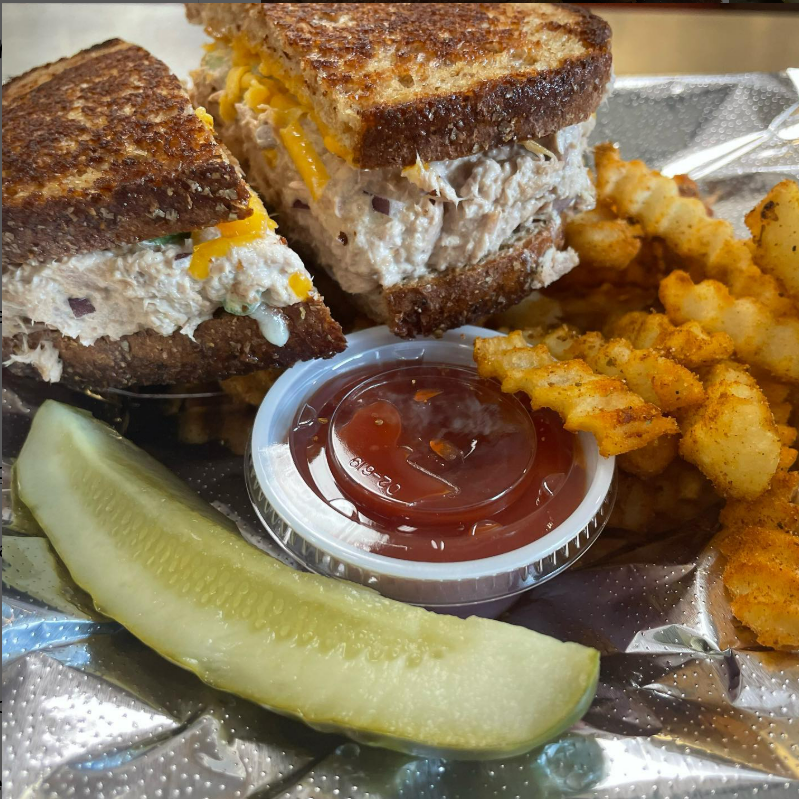 Tuna melt on toast with pickle and fries