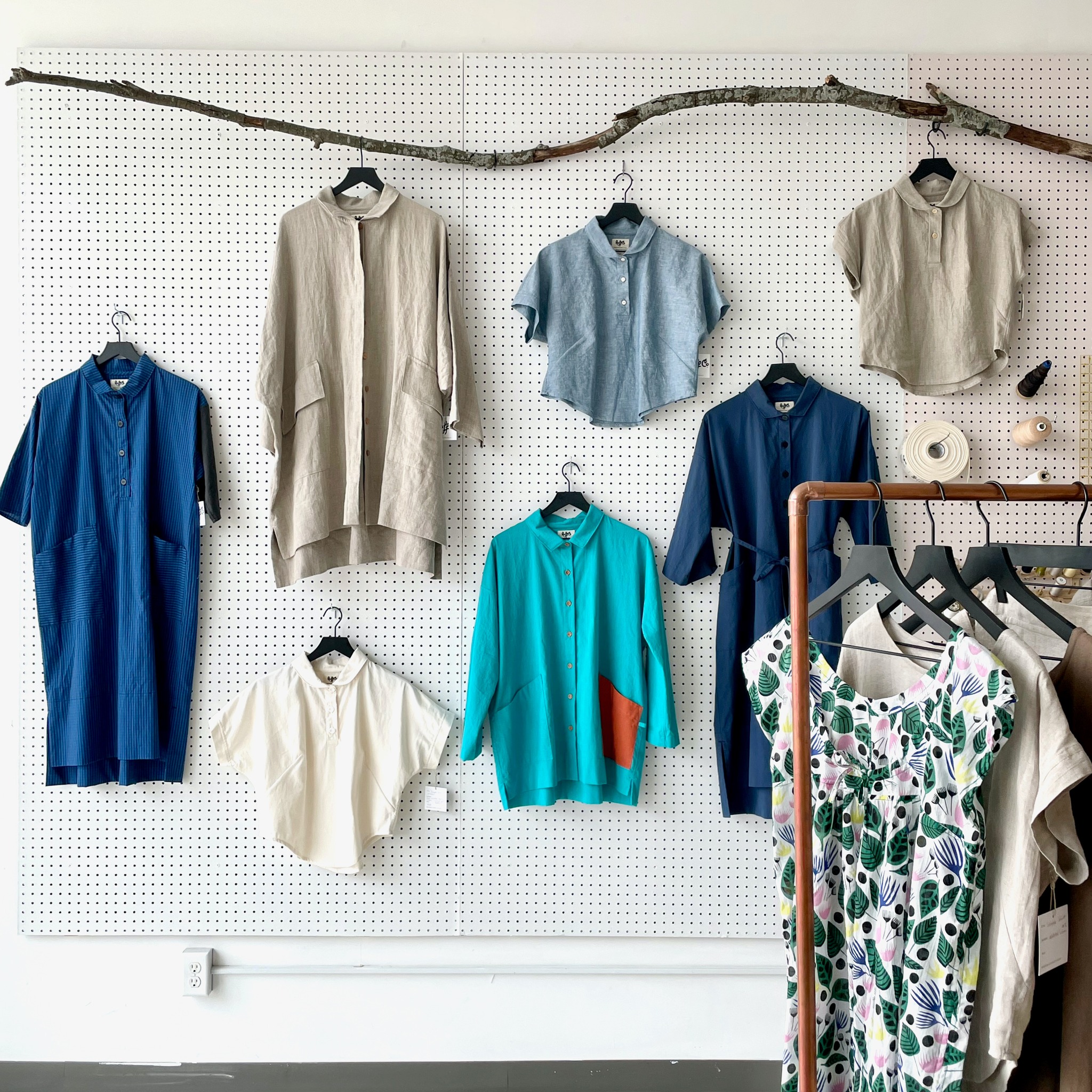 Sustainable clothing hanging on wall
