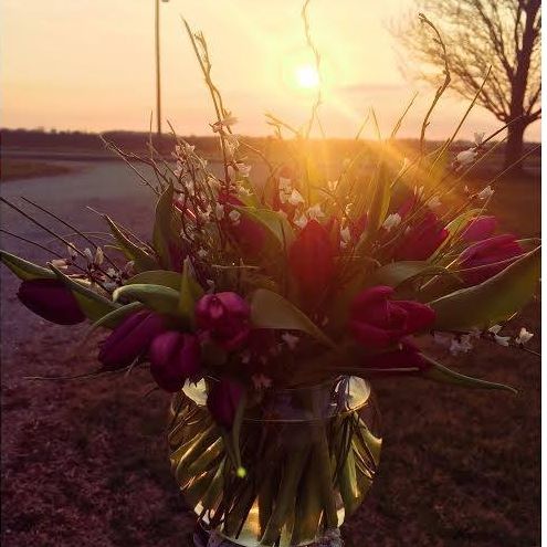Flower arrangement with roses from The Flower Pot Florals and Boutique