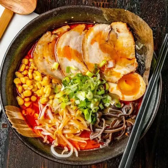 Spicy Miso with sweet corn, stir-fried pork belly, bean sprouts, and green onion.