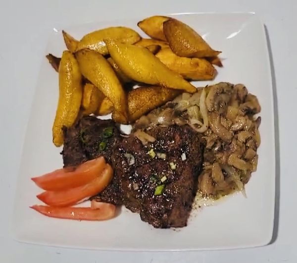 Beef steak with plantains from Les Gourmets Cuisine.