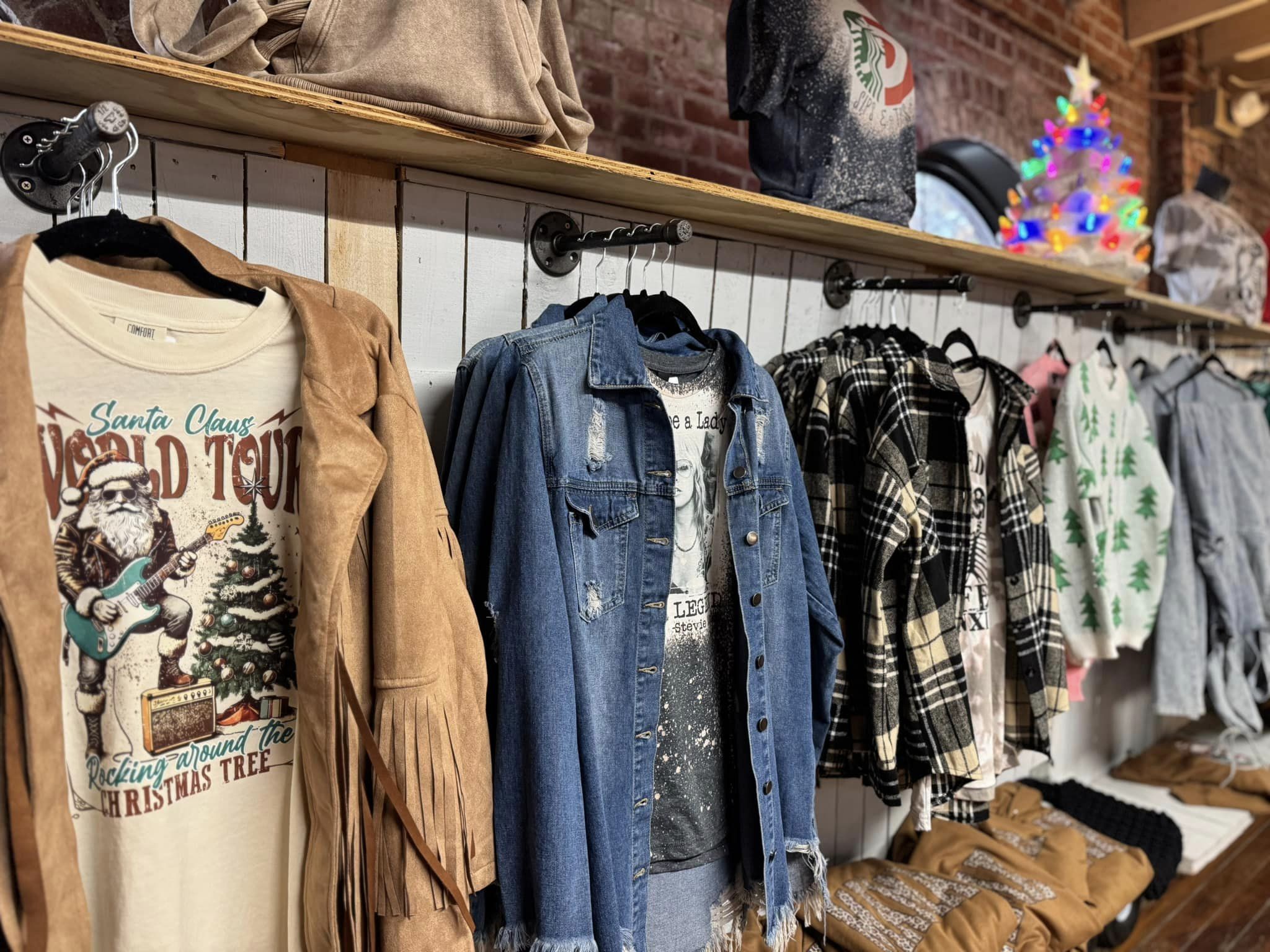 Women\'s flannels on hangars