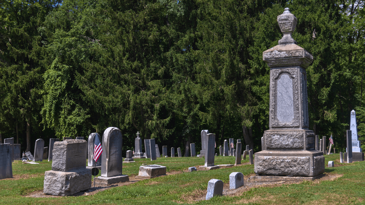 View of Braceville Township Cemetery in Trumbull County, Ohio, with historic gravestones and monuments honoring pioneers and early residents.