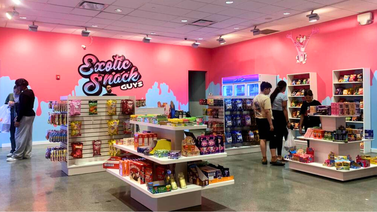 exotic-snack-guys-eastwood-mall-niles-ohio-global-candy-rare-soda Interior of Exotic Snack Guys store at Eastwood Mall in Niles, Ohio, featuring global snacks, international candy, and rare sodas.